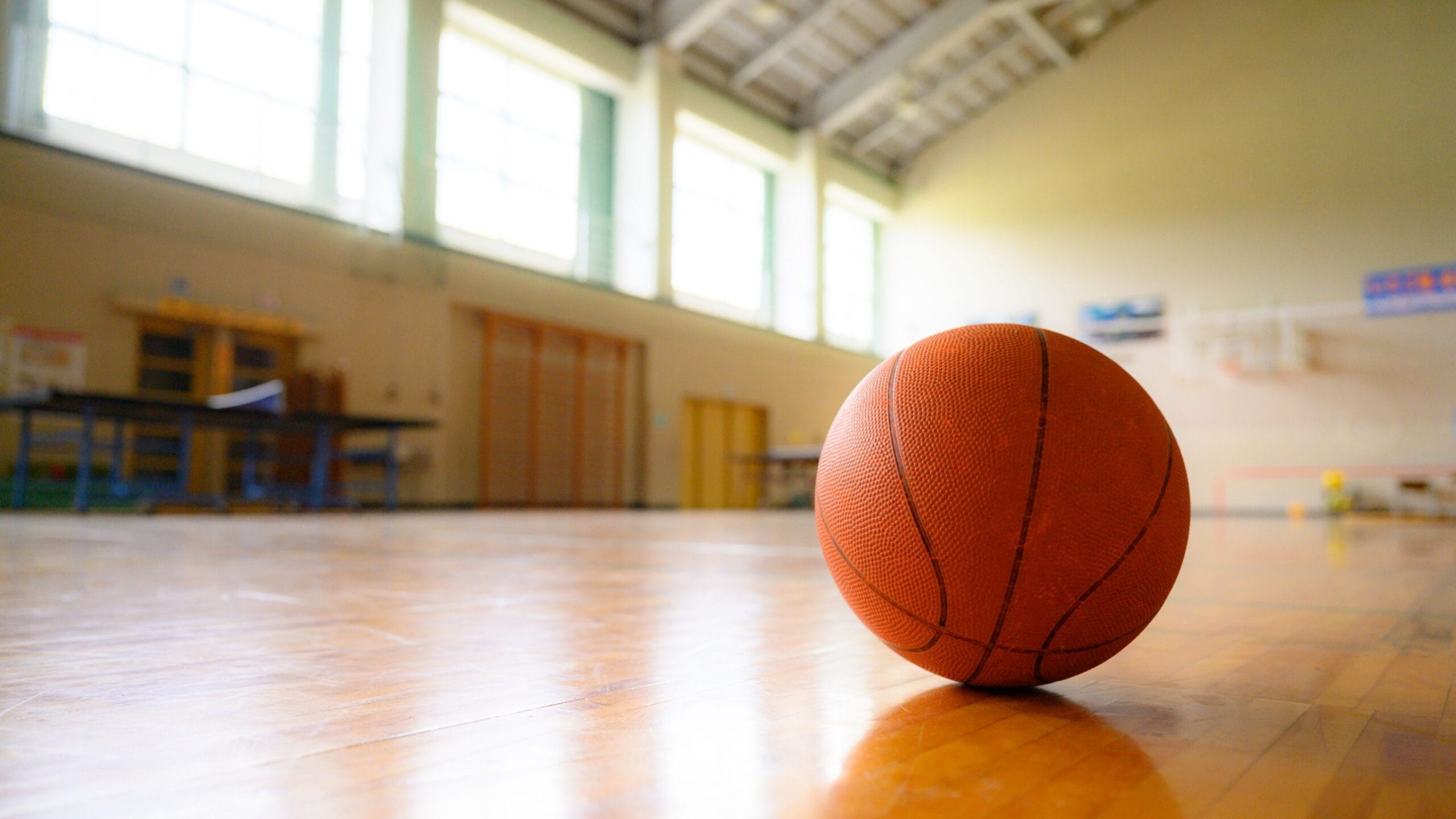 Image of a basketball on a court.