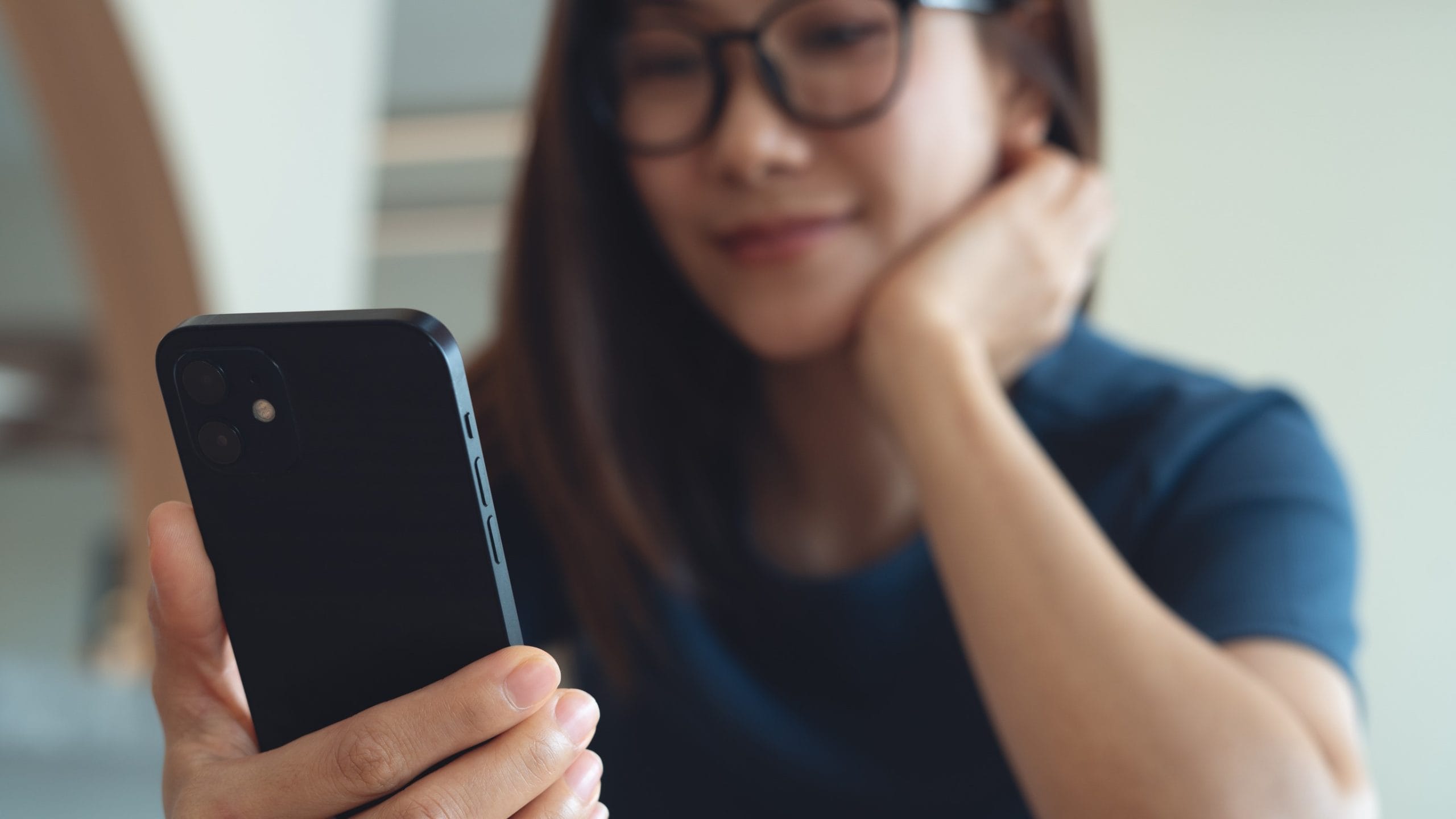 Image of a woman on a smartphone