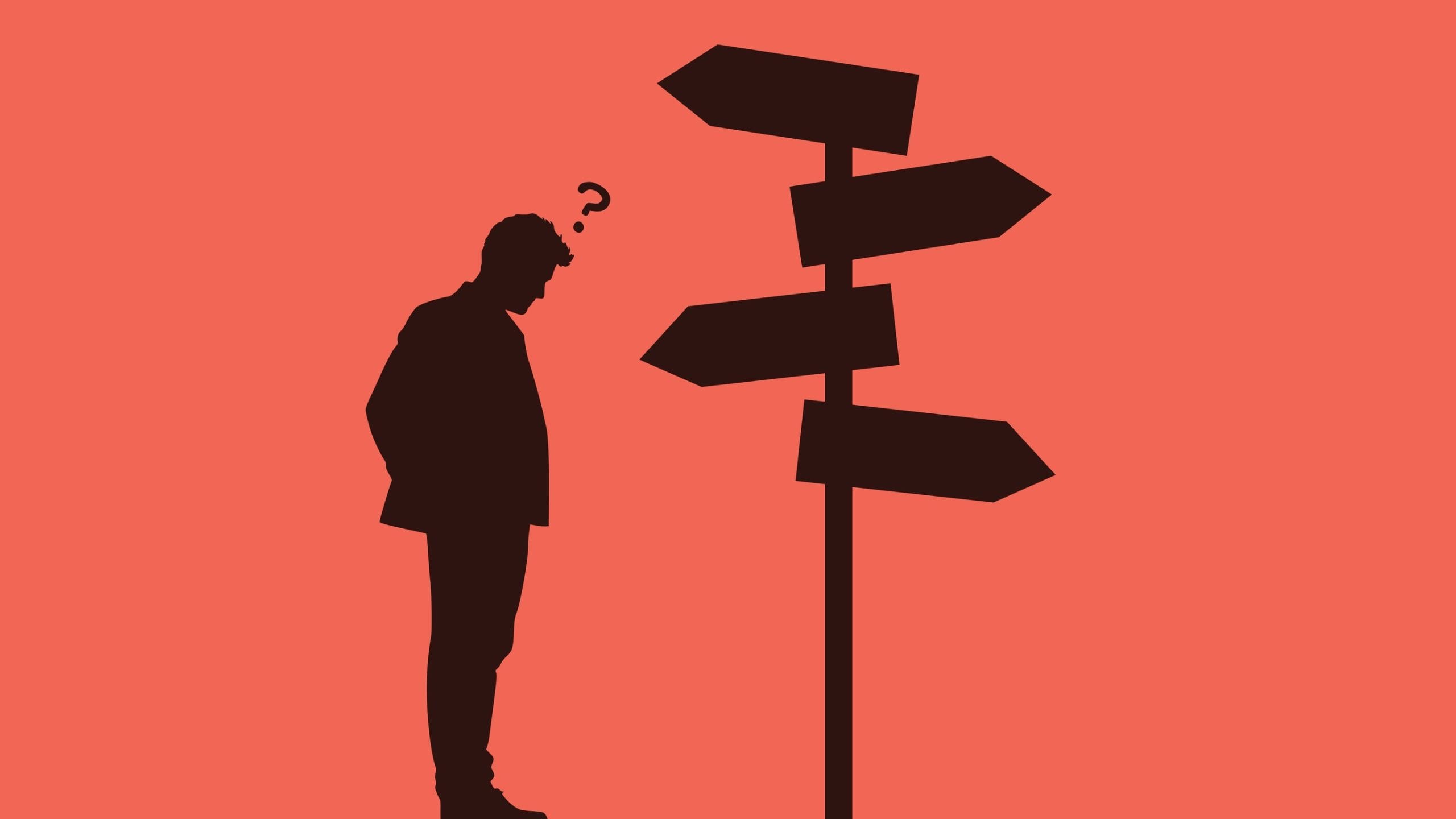 Image of a person stood confused by a series of signposts