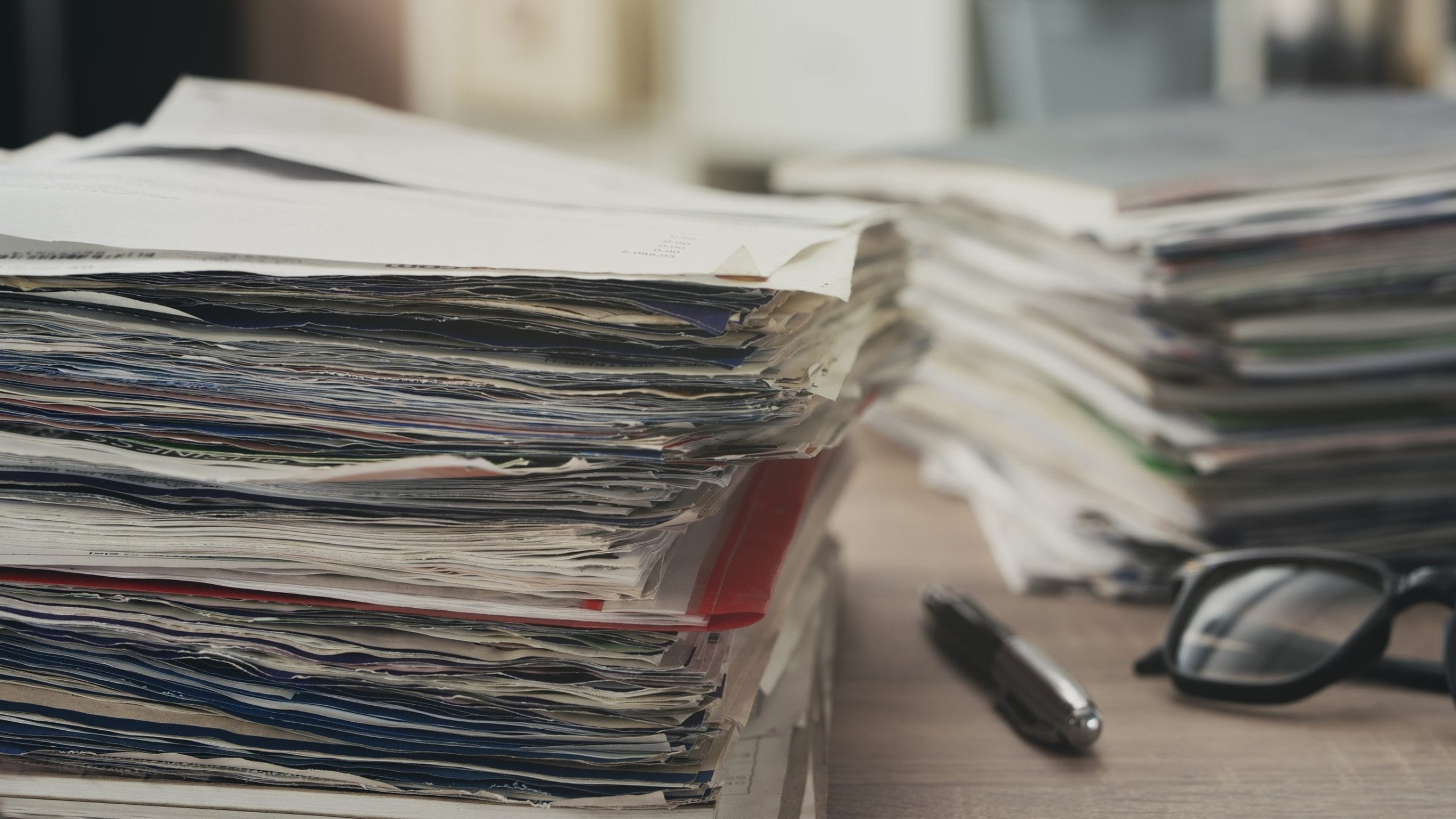 Image of a stack of papers on a desk
