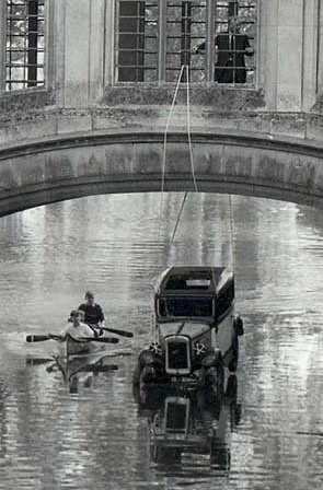 An image of a car floating under the bridge of sighs