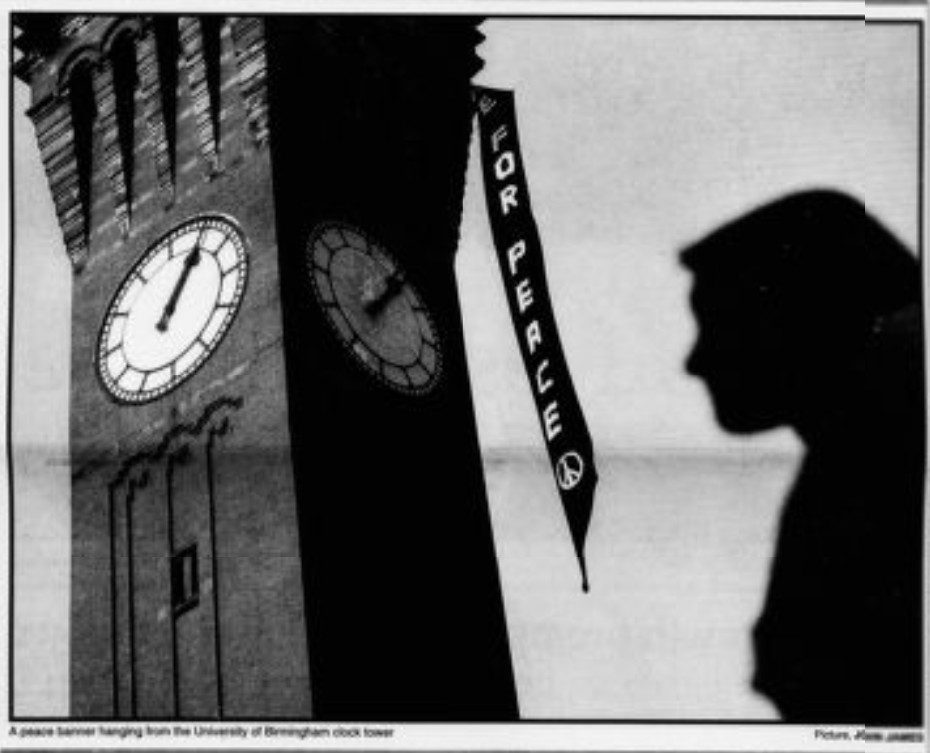 Black and white image of students protesting the Iraq War in 2003