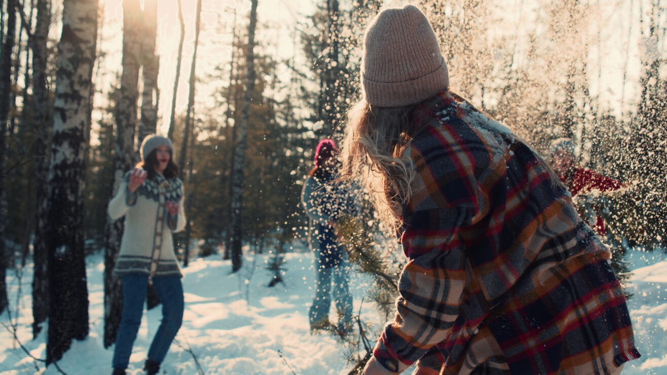 Happy,Diverse,Friends,Enjoy,Fun,Snowball,Fight,At,Sunny,Winter