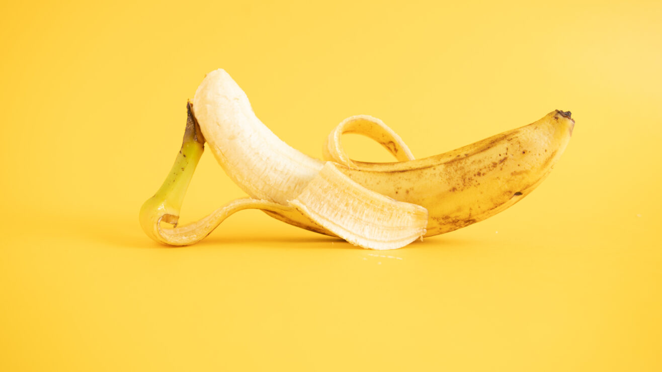 A,Closeup,Shot,Of,A,Peeled,Ripe,Banana,Isolated,On