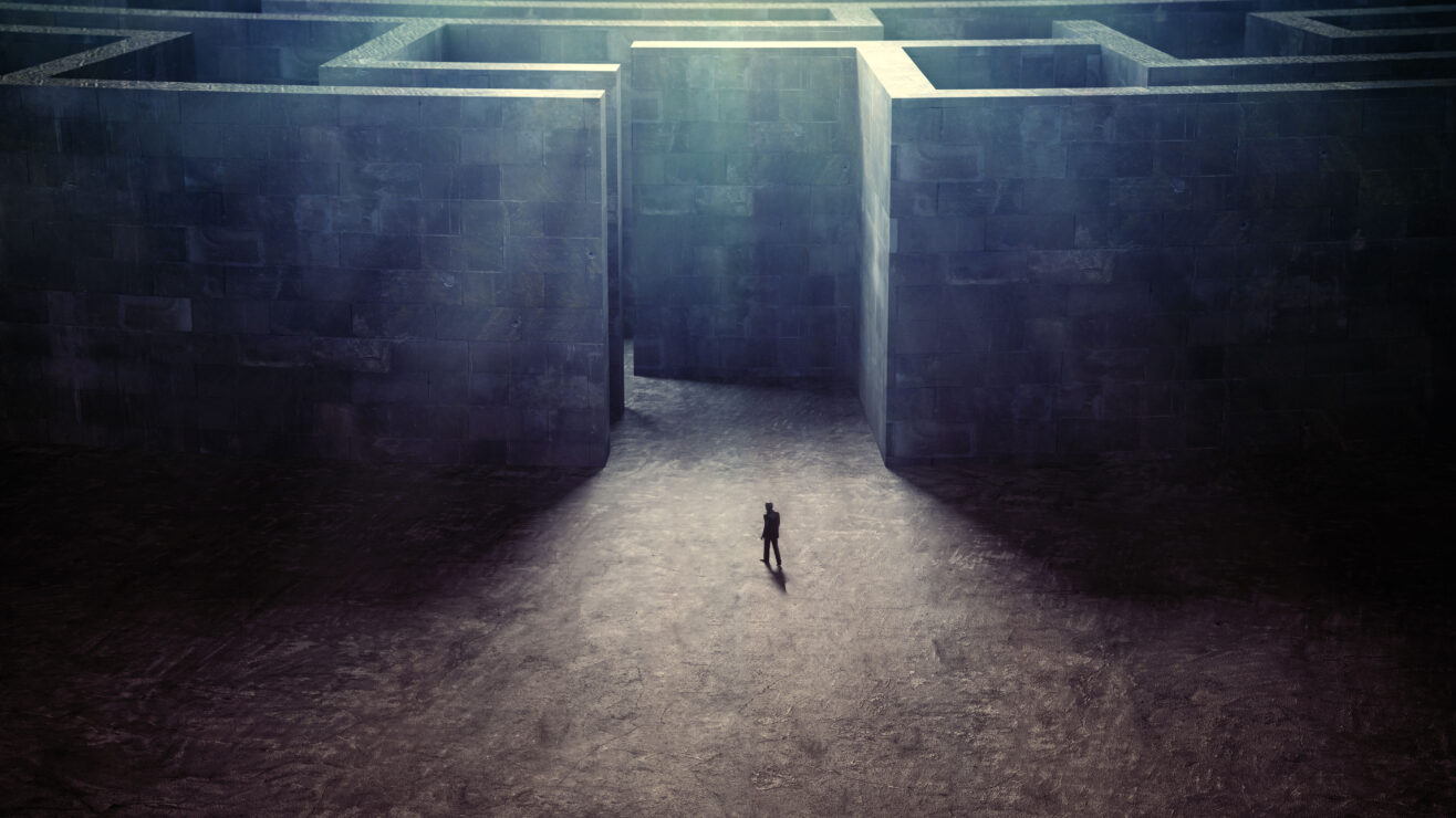 Tiny,Man,Entering,A,Mysterious,Maze