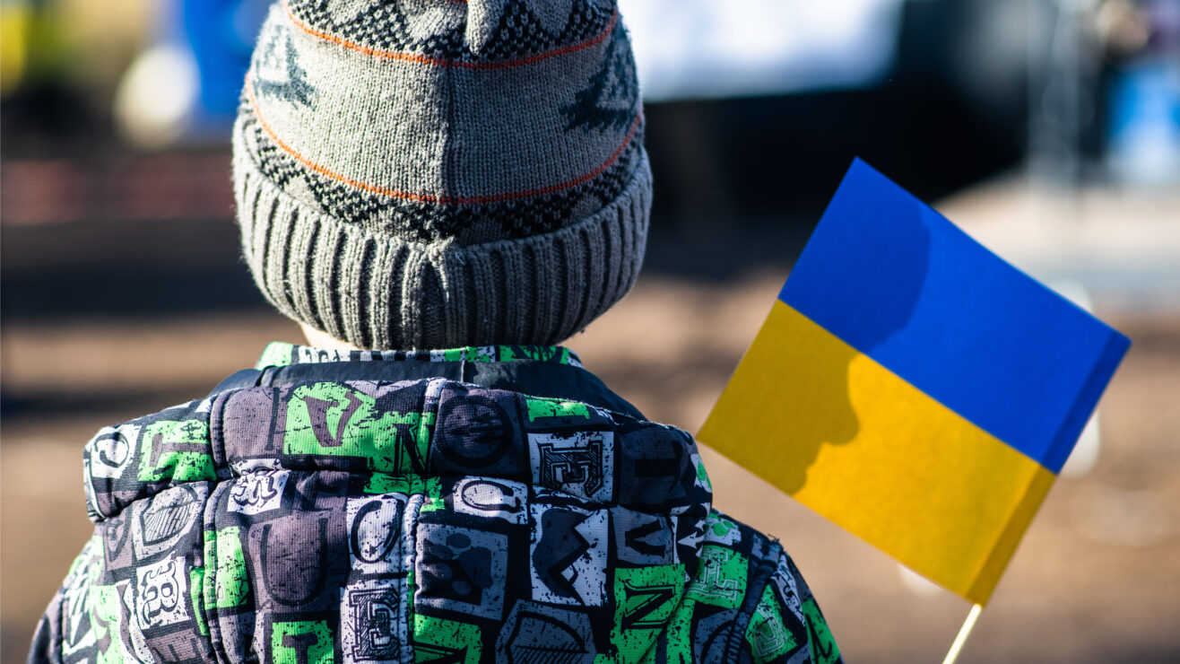 Child,Or,Kid,With,Winter,Clothes,,Hat,And,Ukrainian,Flag,