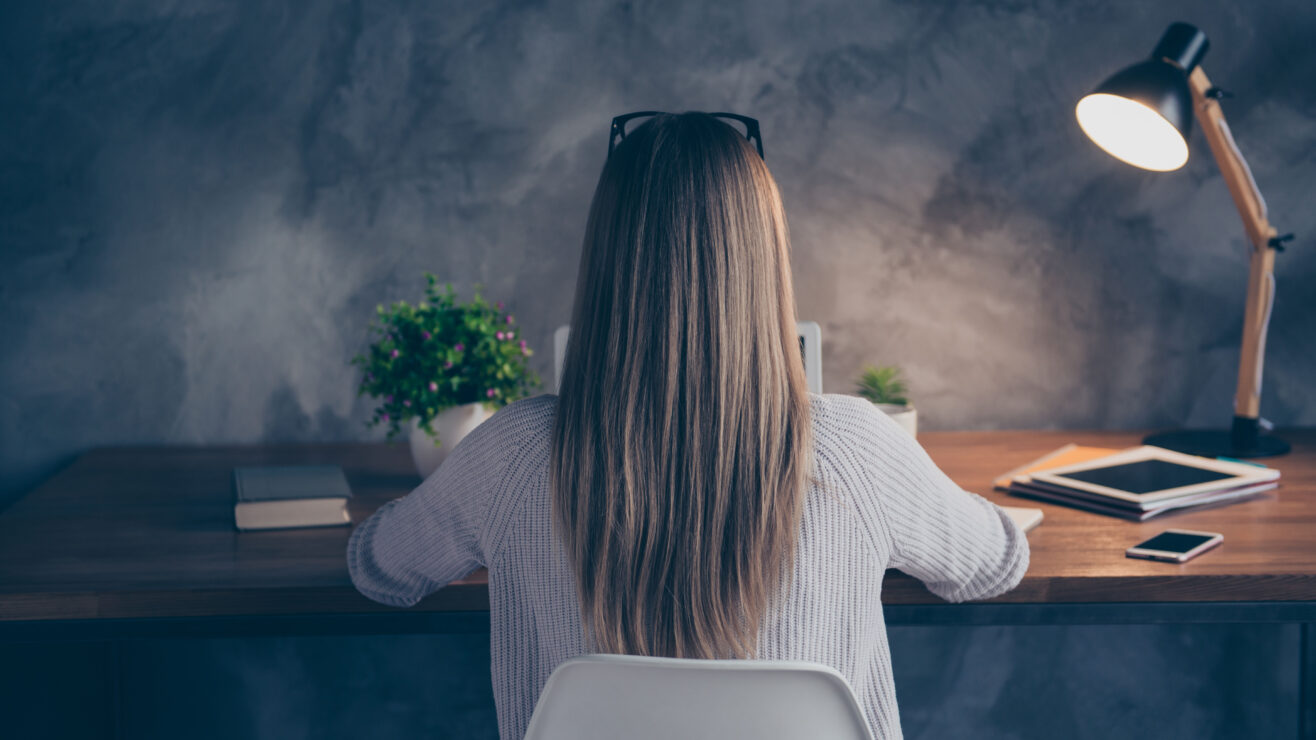 Rear,View,Of,Smart,Corporate,Woman,With,Long,Hair,Spectacles