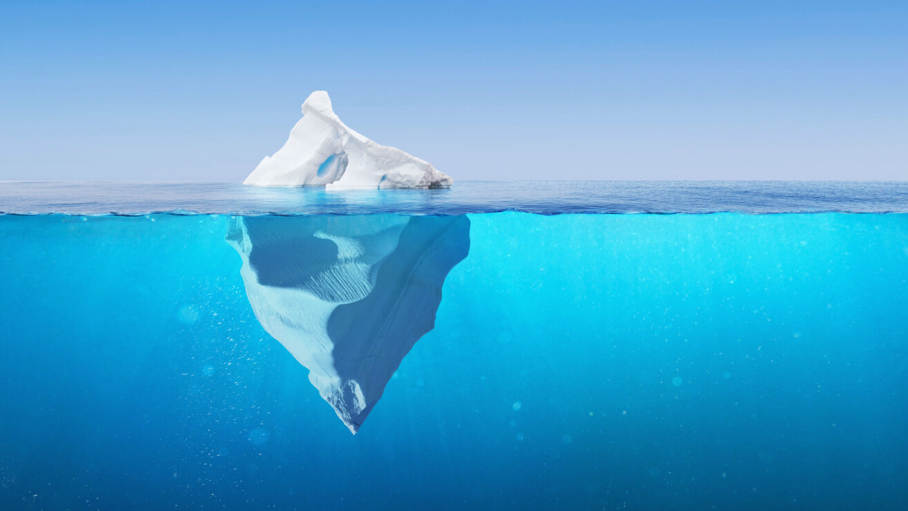 Amazing,Iceberg,In,Clear,Blue,Water,Sea,And,Hidden,Danger