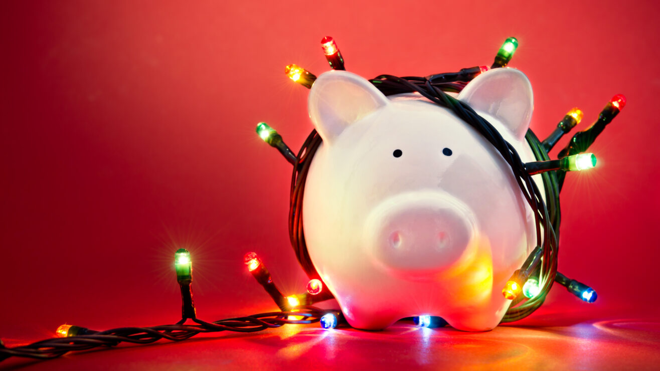 Piggy,Bank,Wrapped,In,Christmas,String,Lights