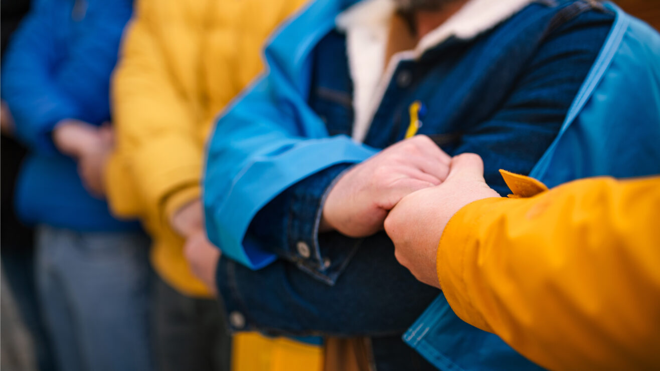 Cropped,Shot,Of,Protestors,With,Ukrainian,Blue,And,Yellow,Ribbons