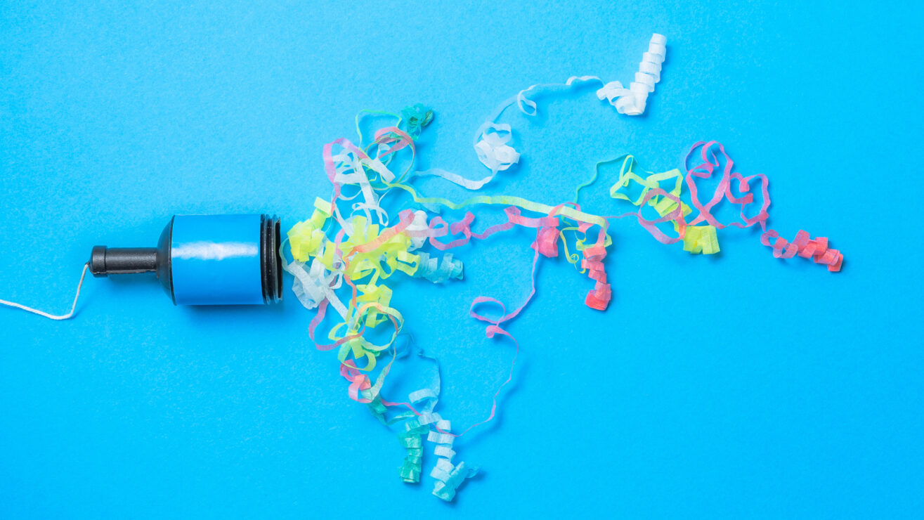 Party,Popper,Confetti,Streamer,Isolated,On,Blue,Background.,Happy,Birthday