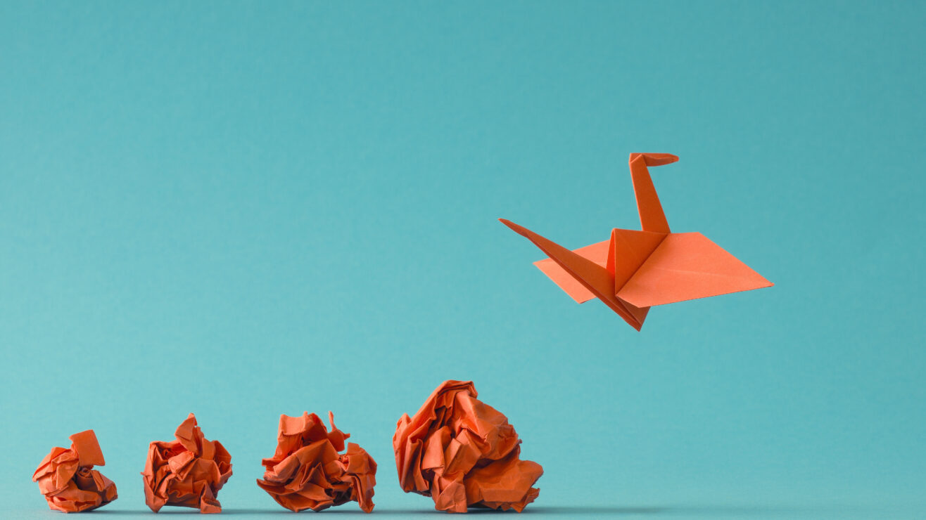 New,Ideas,Or,Transformation,Concept,With,Crumpled,Paper,Balls,And