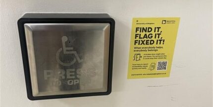 Image of a disabled access door button and a yellow "find it, flag it, fixed it" sign